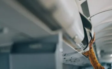 imgi_21_young-female-tourist-with-luggage-walking-through-airplane-cabin-ready-travel-adventure_265022-95810 imgi_21_young-female-tourist-with-luggage-walking-through-airplane-cabin-ready-travel-adventure_265022-95810